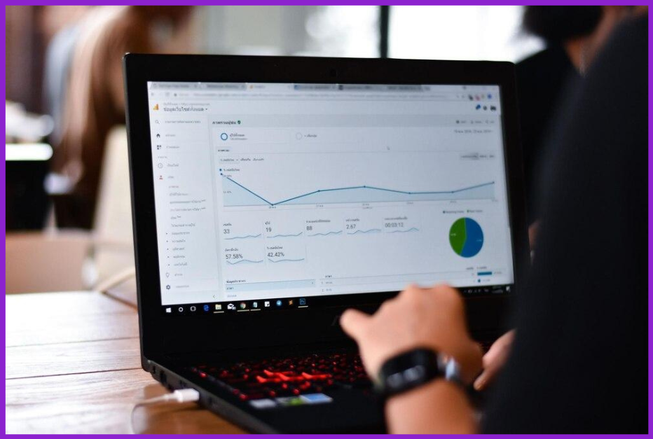 Image showing a person viewing Google Analytics dashboard on their laptop