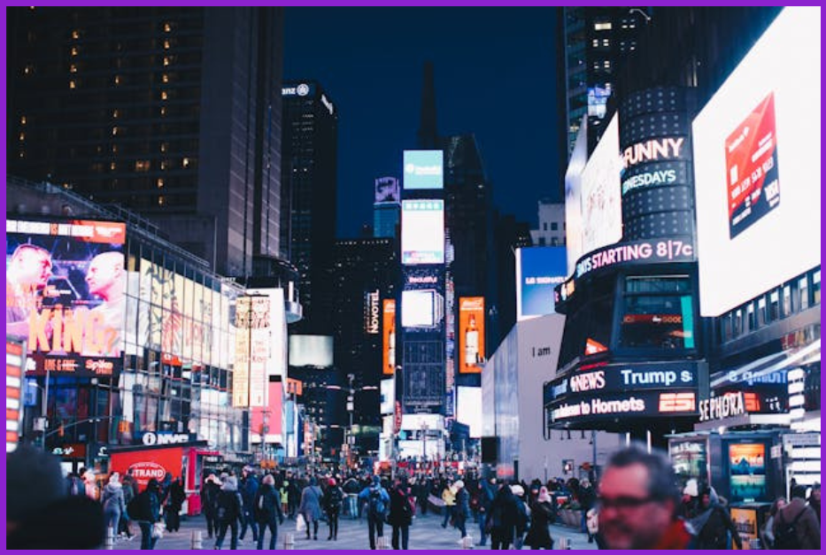 digital billboards at a busy city junction